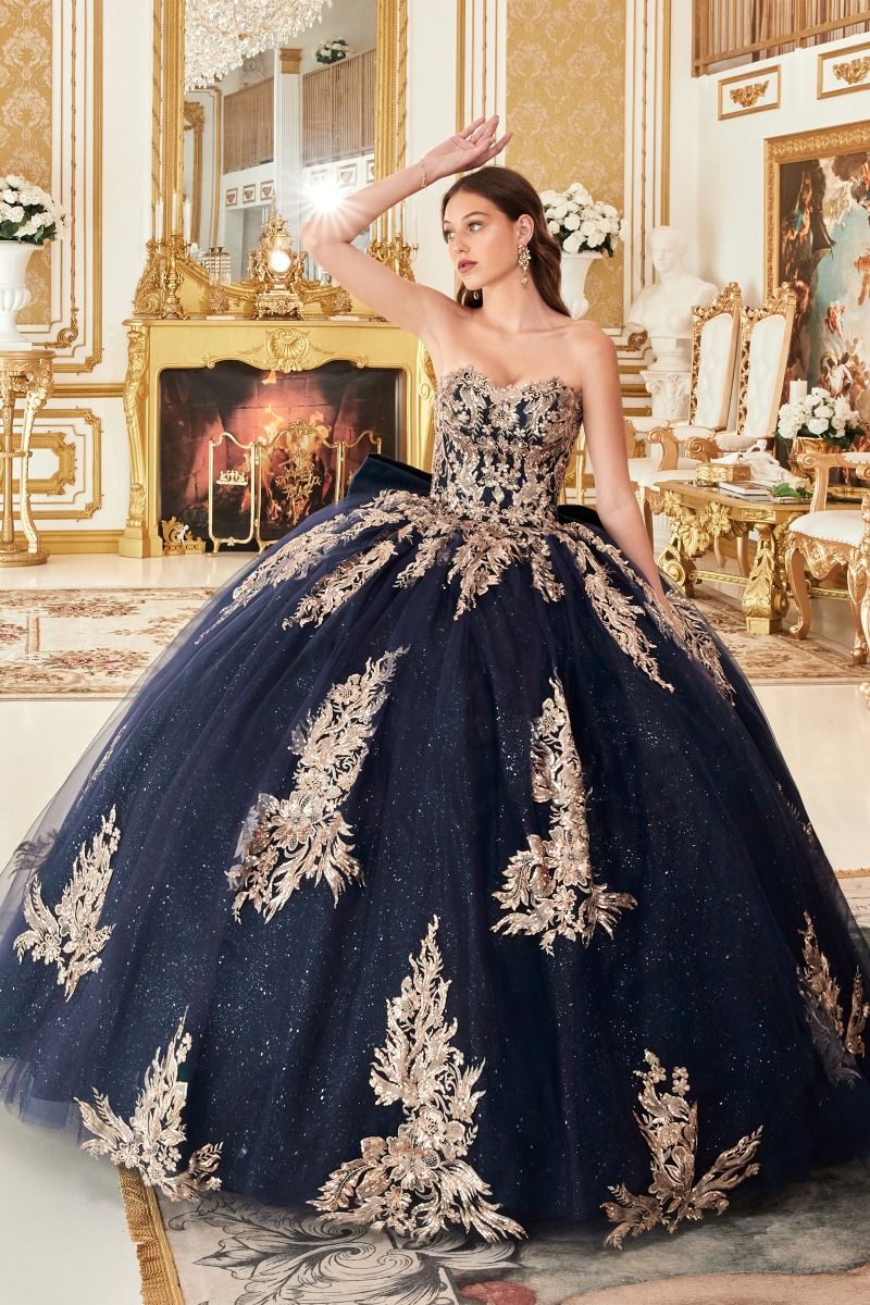 15715 STRAPLESS LAYERED BALL GOWN WITH BOW DETAIL (NAVY-GOLD) - QUINCE Lucys Formals 15715 STRAPLESS LAYERED BALL GOWN WITH BOW DETAIL (NAVY-GOLD) - QUINCE Lucys Formals